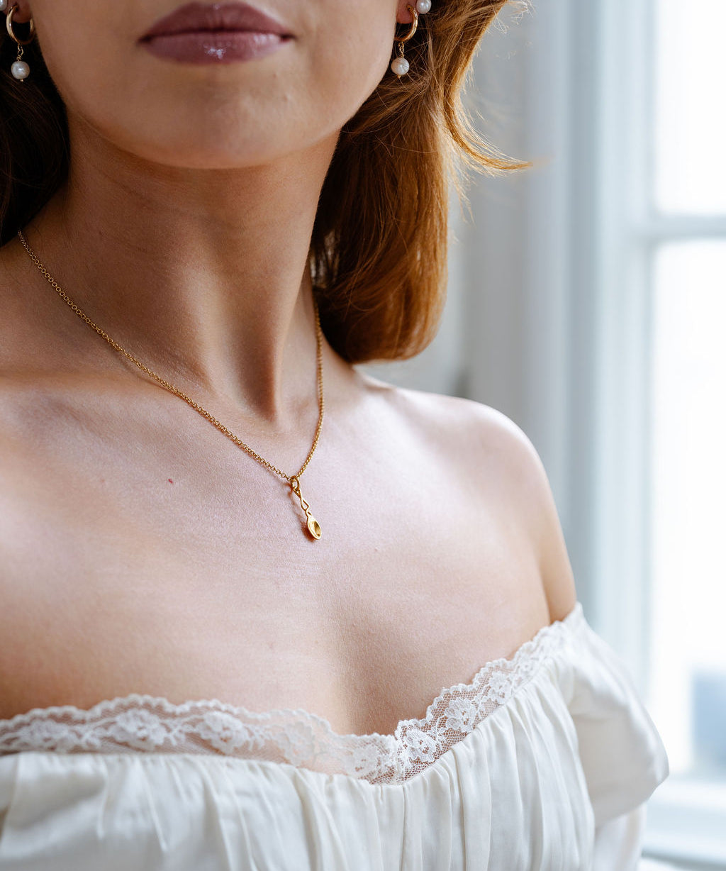 Gold necklace with  Arianwyn lovespoon gold pendant