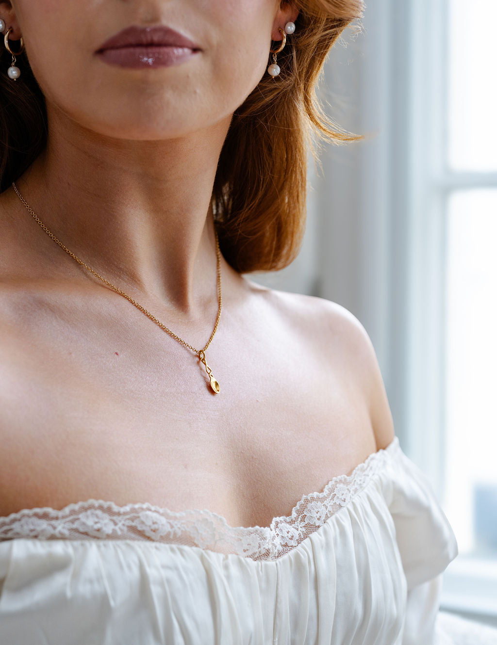 Gold necklace with  Arianwyn lovespoon gold pendant