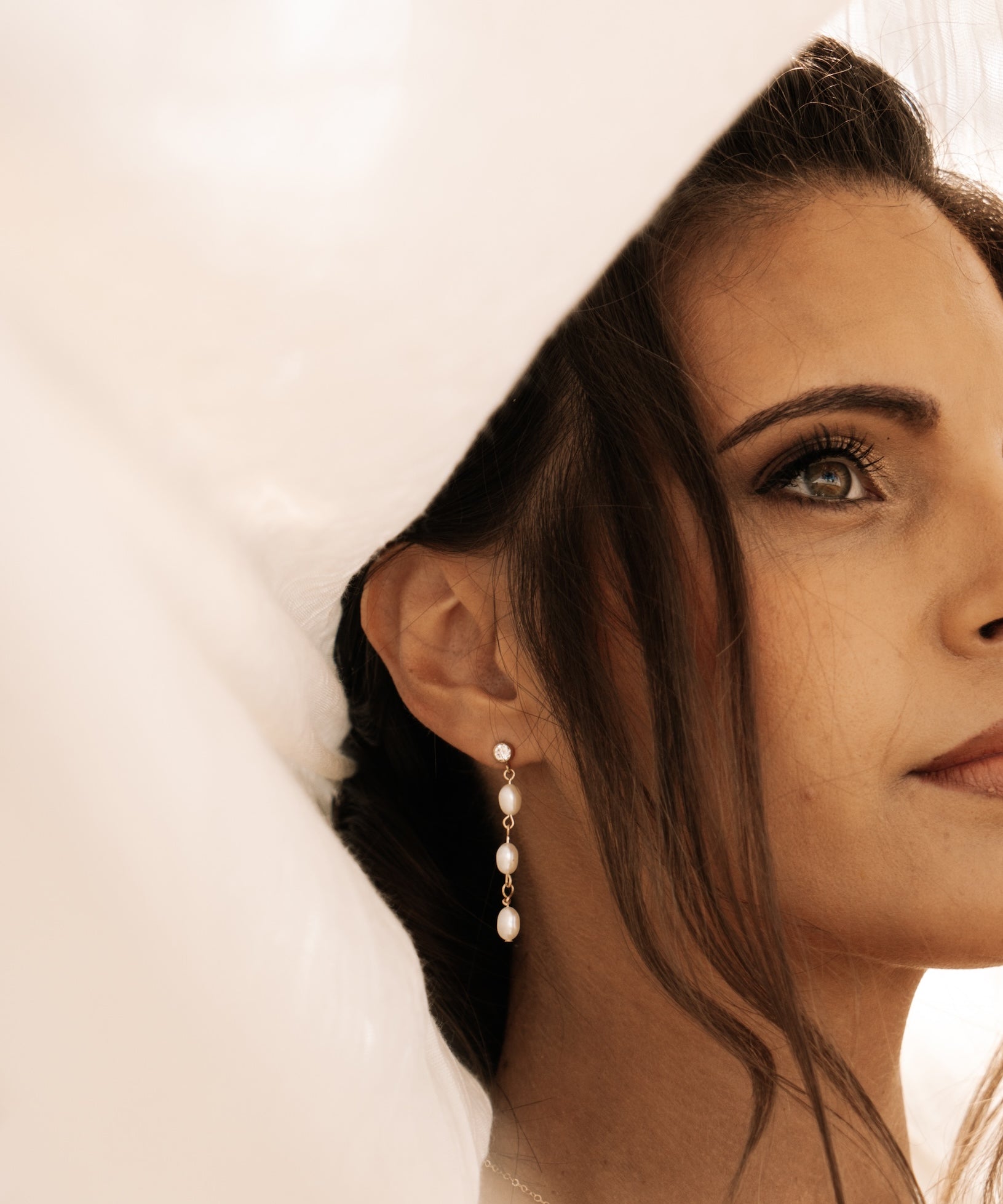 Bride with wedding pearl earrings