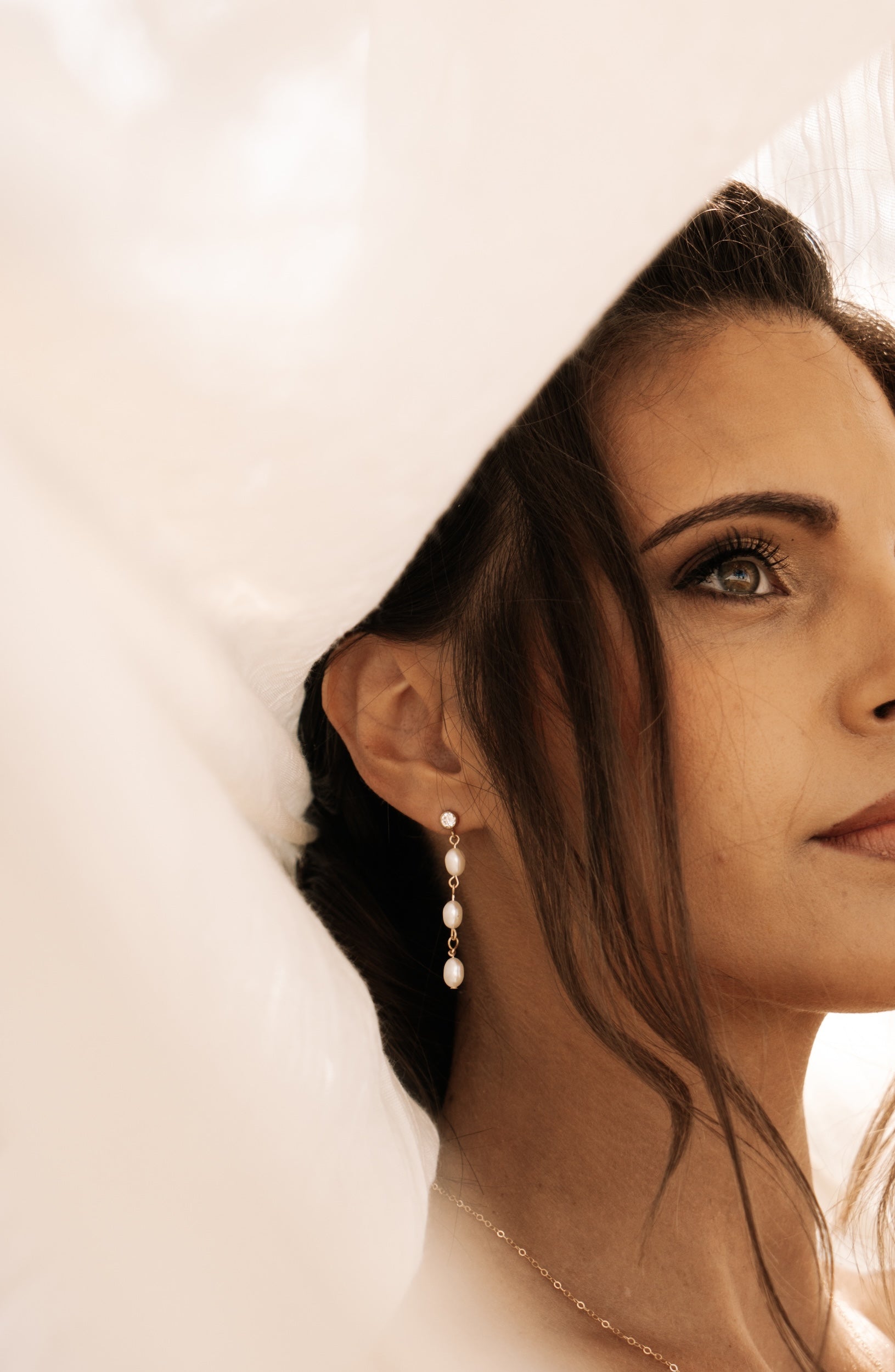 Bride with wedding pearl earrings