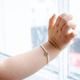 Mini initial pendant rice pearl bracelet