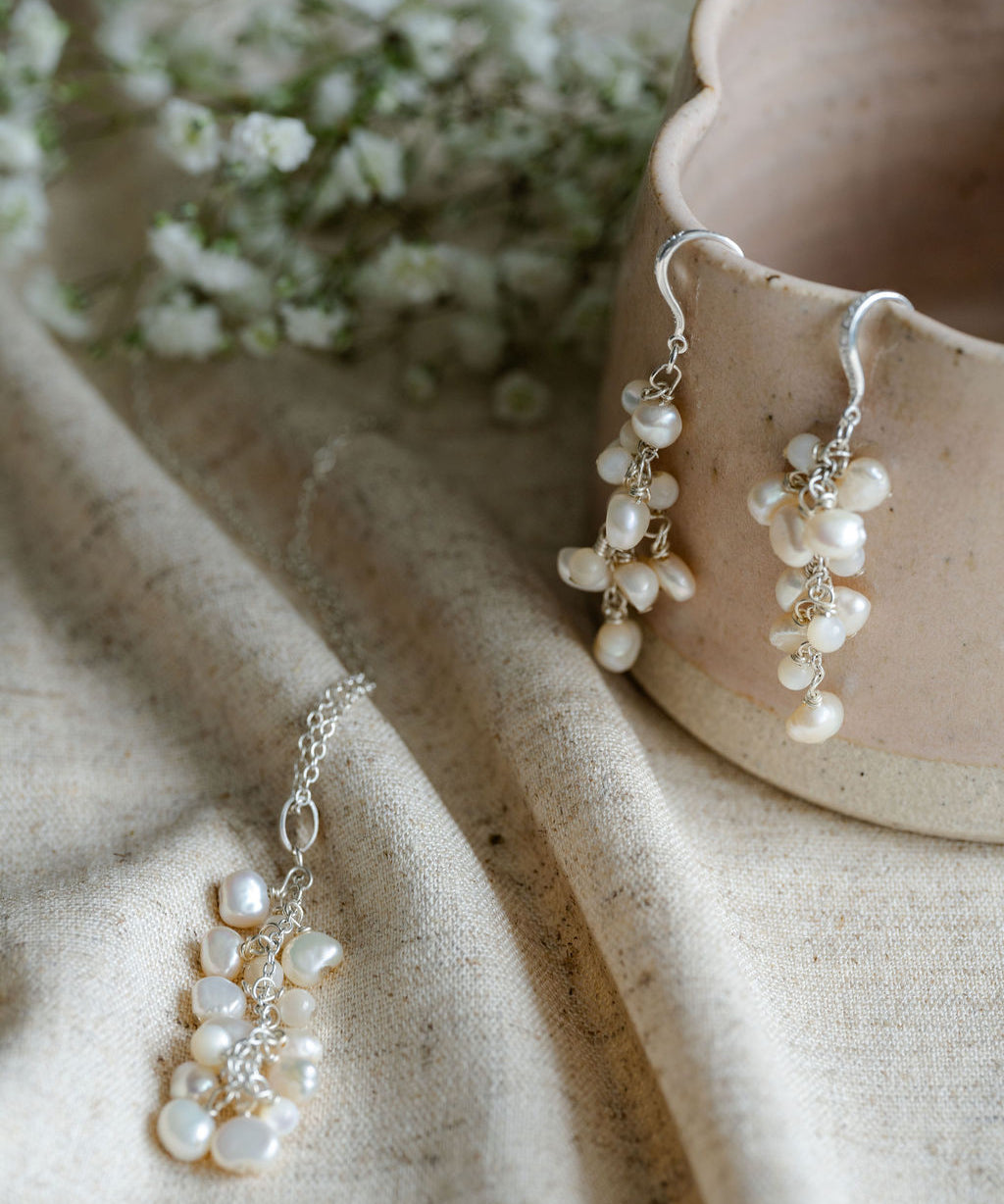 Pearl earrings and pearl necklace with mother of pearl beads 