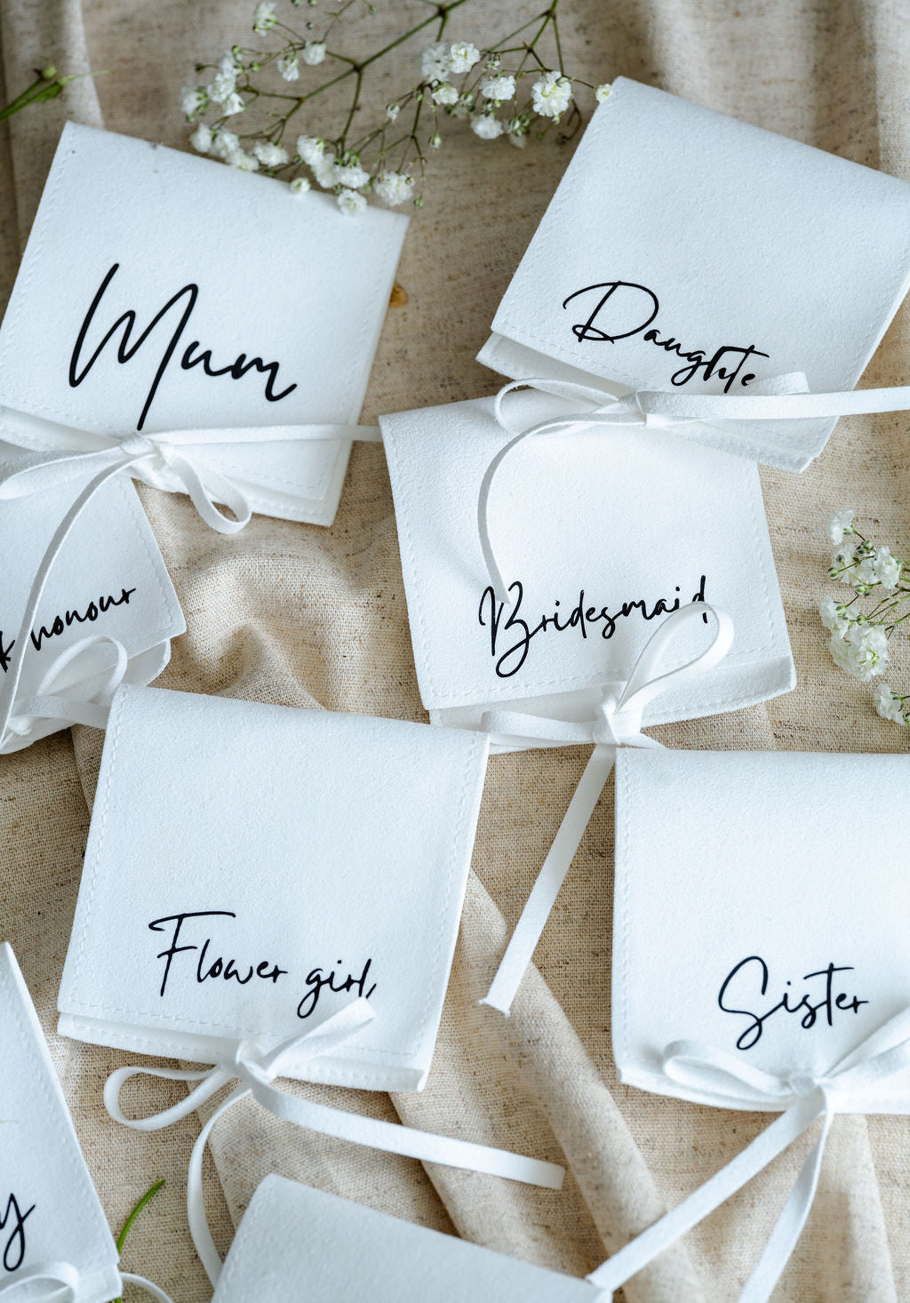 White pouches with choice of personalised writing