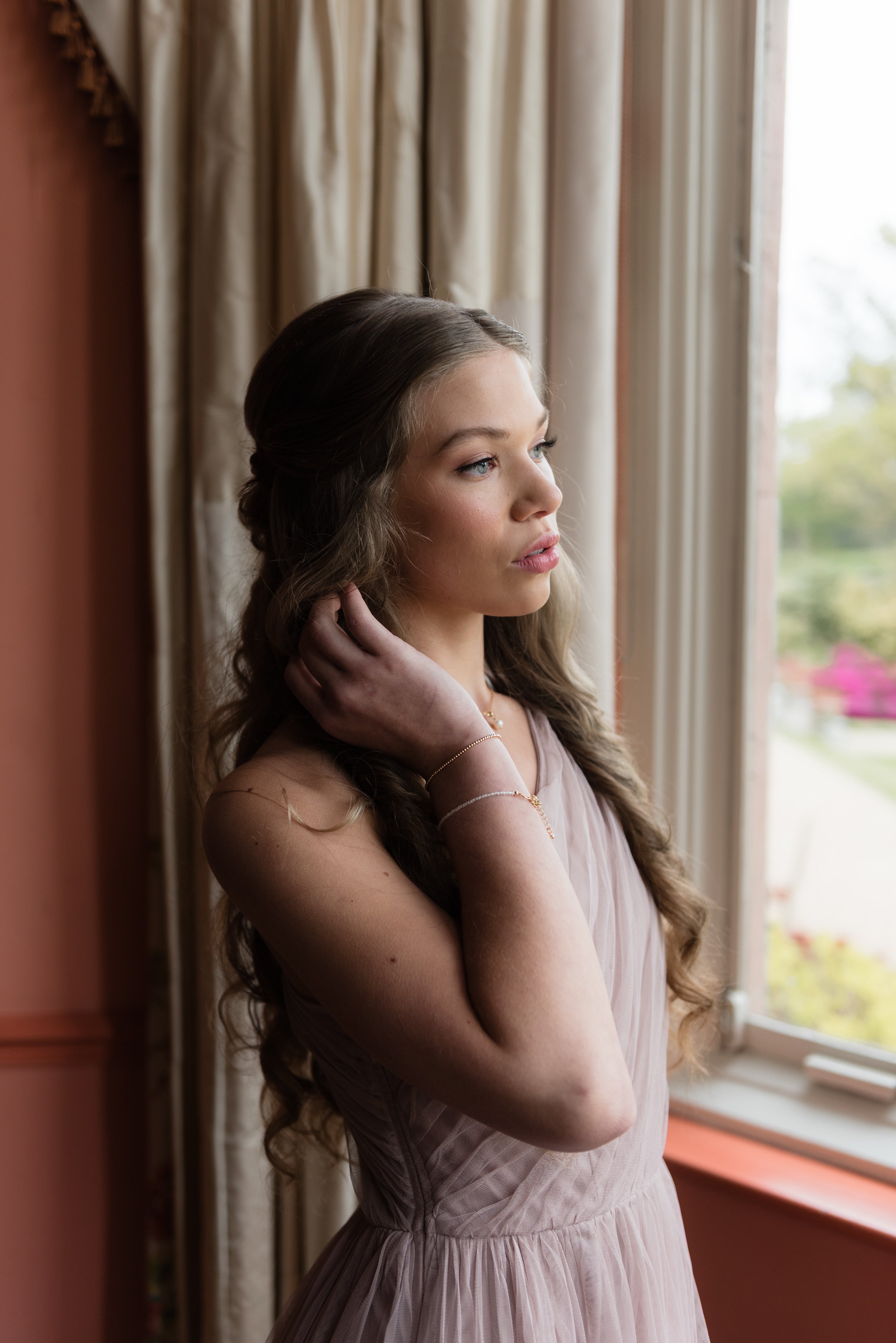 bridesmaid wearing birthstone bracelet